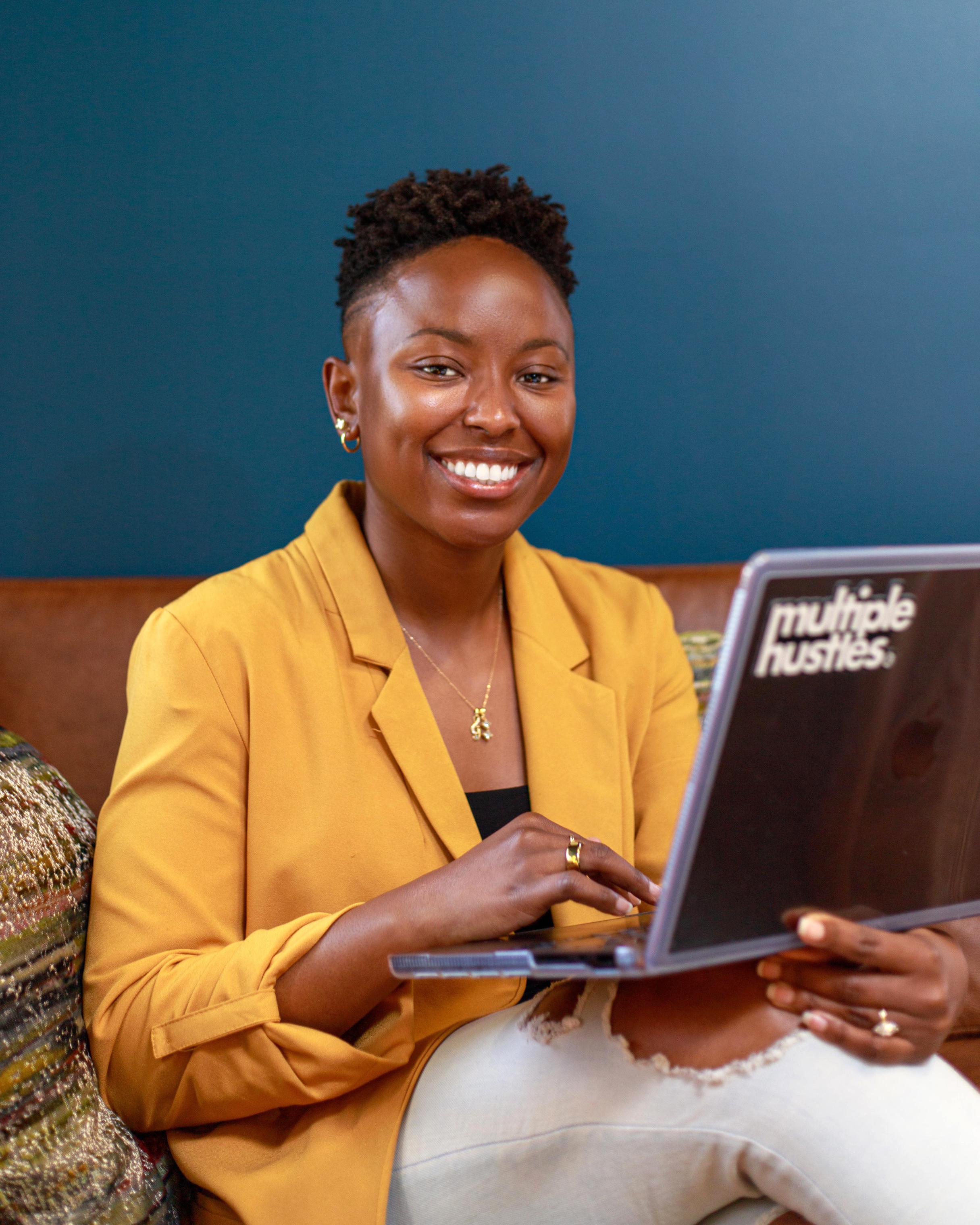 Ashlee sitting with laptop